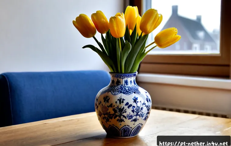 Home 17 네덜란드에서 추천하는 기념품 - Photorealistic Dutch souvenir still life on a sunlit wooden table: elegant blue-and-white hand-paint...